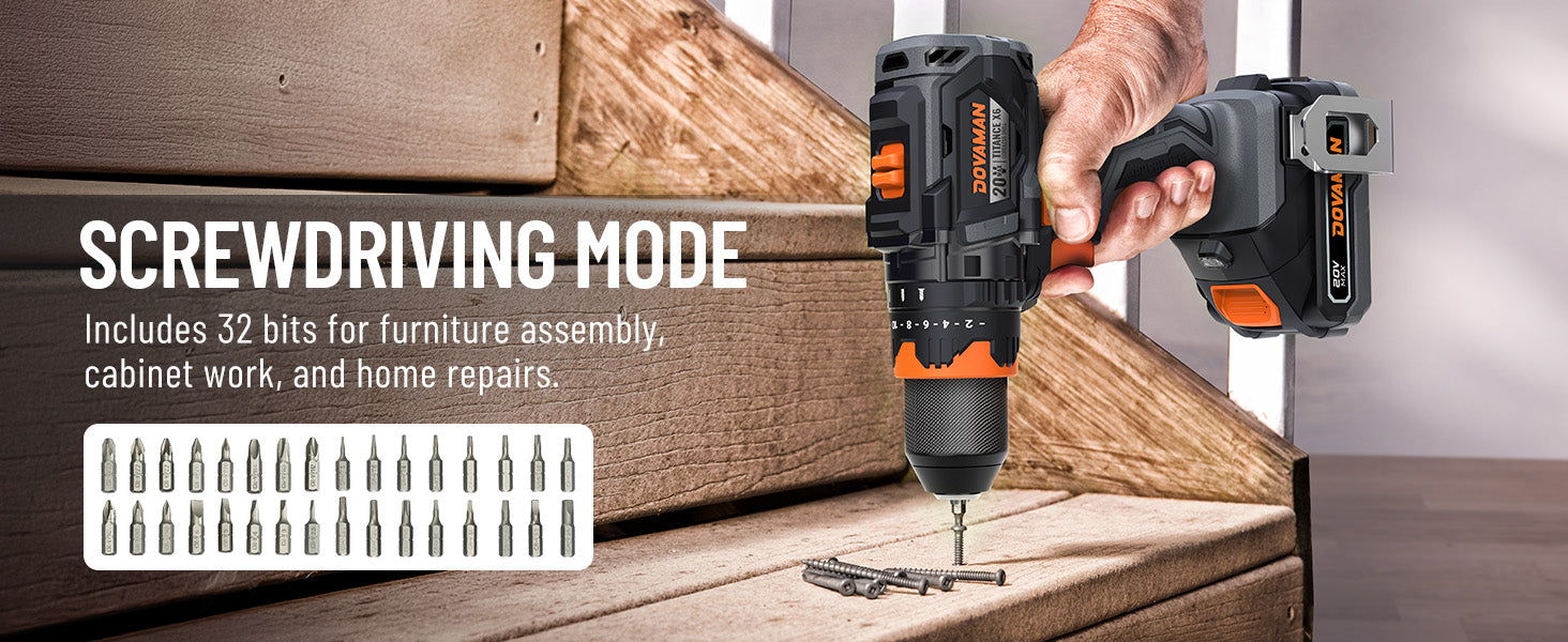 Black and orange cordless drill being used on wooden furniture with screwdriver bits displayed.