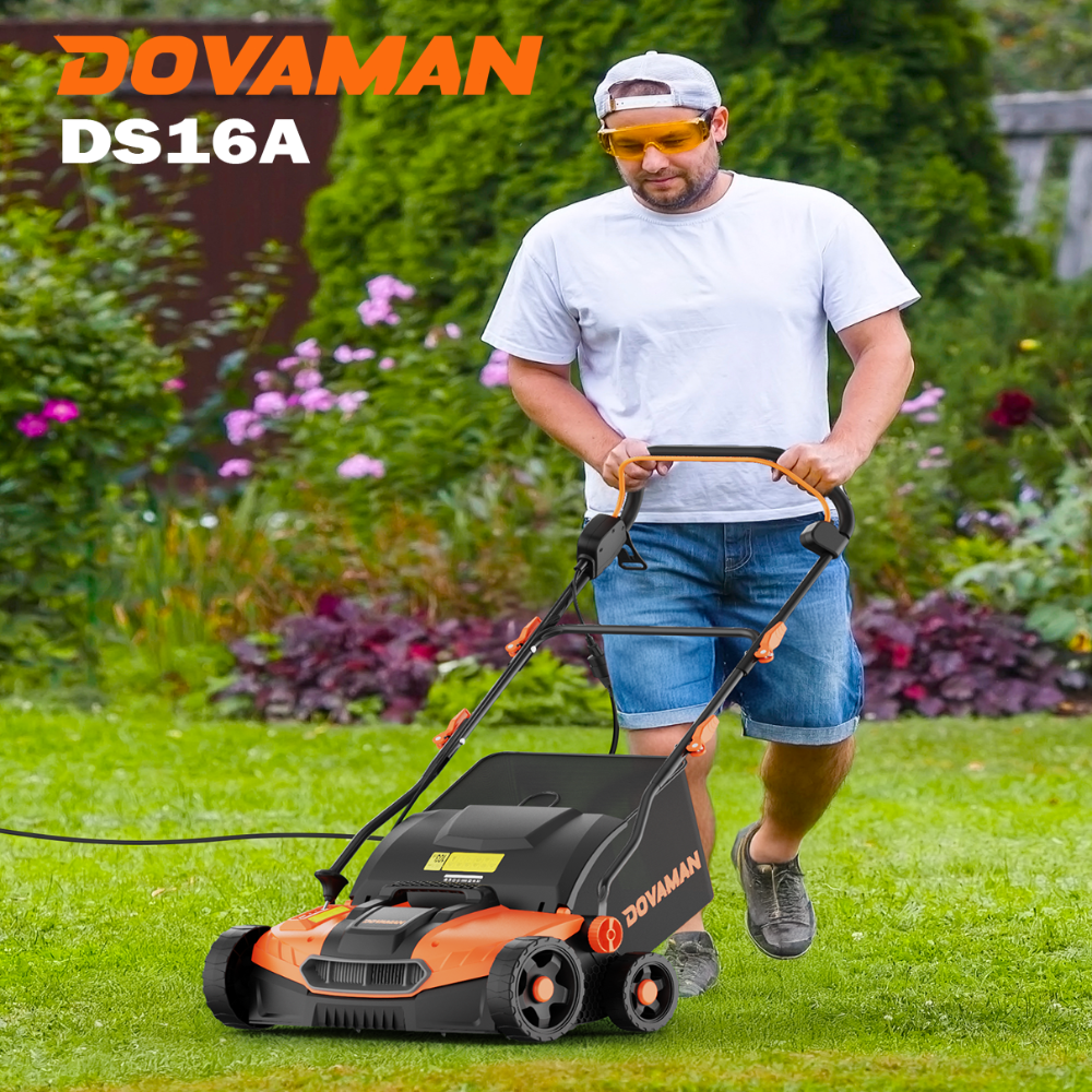 Man using a DOVAMAN DS16A dethatcher scarifier in a garden setting
