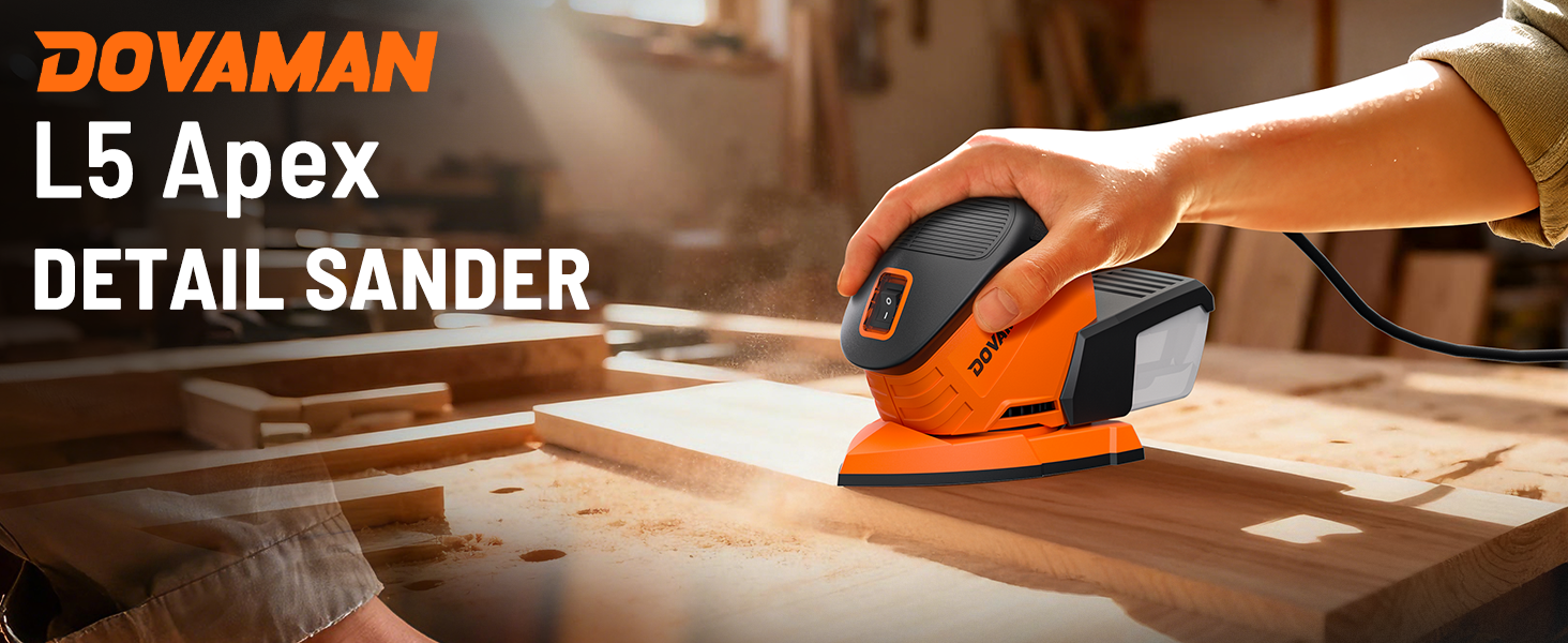 Person using a Dovaman L5 Apex Detail Sander on a wooden surface with workshop background.