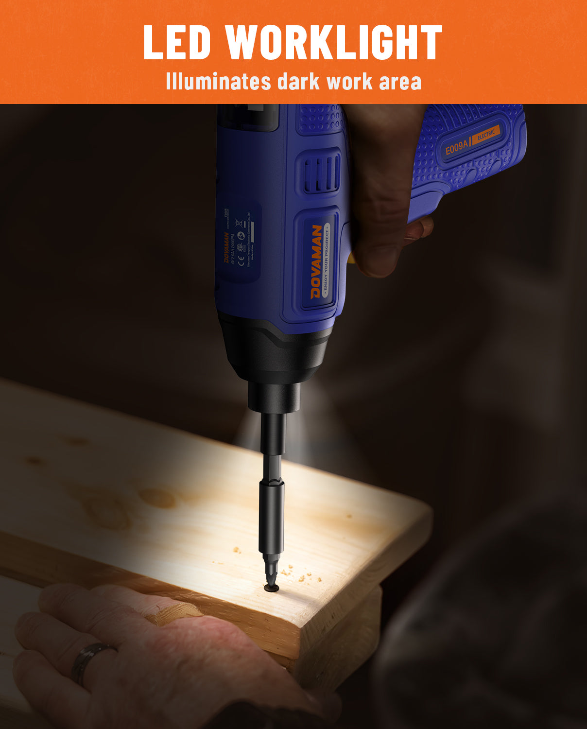 LED worklight illuminating a dark work area while drilling into wood.