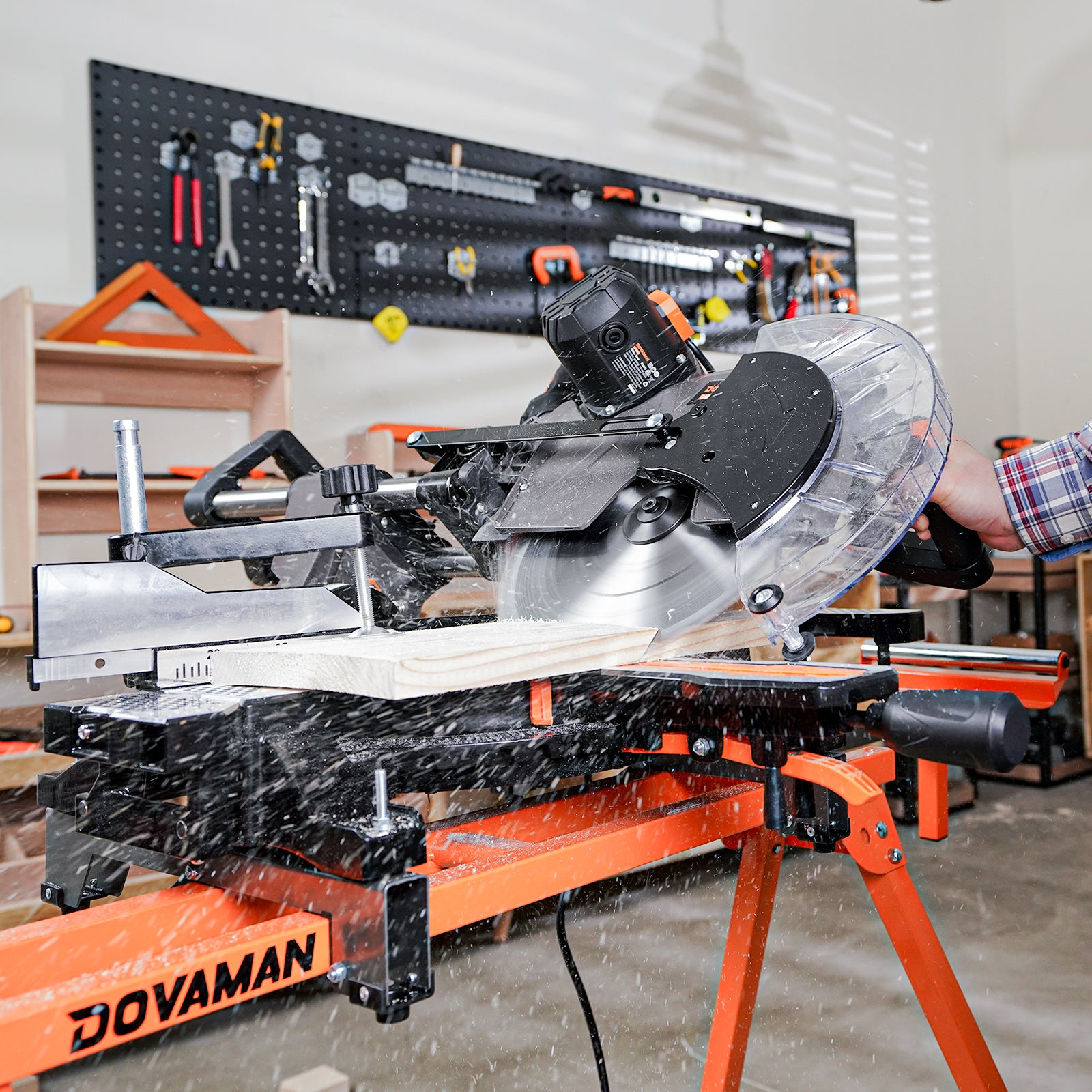 DOVAMAN miter saw mounted on a stand cutting through thick lumber in a workshop setting