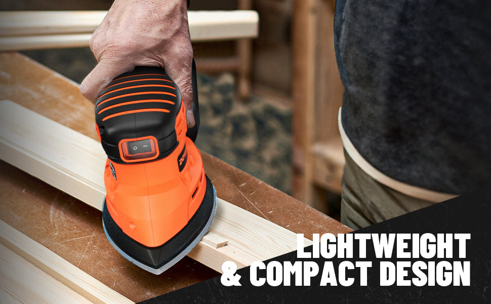 Person using a lightweight and compact orange power tool on wooden planks.